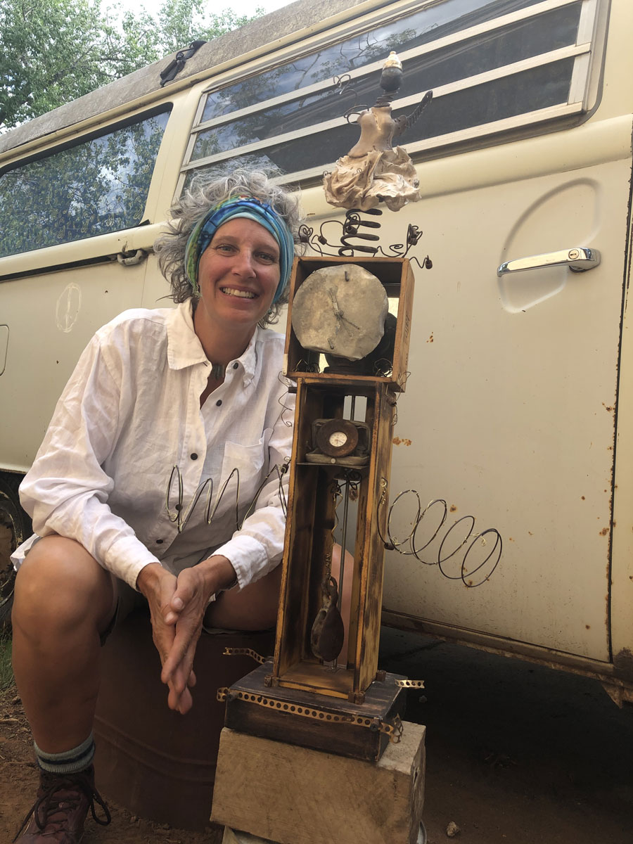 Jodie Atherton with sculpture next to vintage van